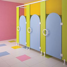 three brightly colored stalls in a room with tile flooring and pink, green, blue, yellow, and white walls