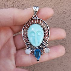 Brand New Handmade Carved Goddess Face Blue Topaz And Rainbow Moonstone Silver Pendant. 925 Stamped New To Poshmark? Use Referral Code Kimberlyn222 To Receive $10. Blue Moonstone Jewelry With Stones, Goddess Face, Rainbow Moonstone, Blue And Silver, Blue Topaz, Womens Jewelry Necklace, Silver Pendant, Moonstone, Topaz