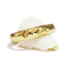 "What can be better than your kid's names wrapped around your finger with this classic handcrafted solid gold name ring? Have any special name imprinted in raised letters on a beautiful custom name ring, this 14 karat gold ring can be stamped with up to 4 names per band depends on the length of the names. This mom ring is a piece of jewelry that anyone would love to adorn, It's unique because it has a high polished background that serves as a perfect canvas to emphasize all names in shiny golden Personalized Gold Rings, Gold Name Ring, Custom Gold Rings, Morganite Ring Set, Pink Morganite Ring