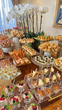 an assortment of pastries and desserts on display