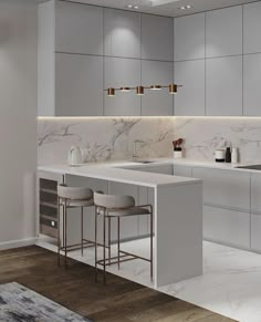 a modern kitchen with marble counter tops and bar stools