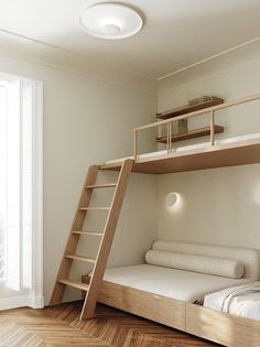 there is a bunk bed with a ladder in the room