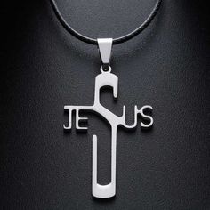 "This beautiful necklace is the perfect way to show off your faith.  The necklace features a cross pendant with the word \"Jesus\" inscribed on it. The necklace is made of sterling silver, giving it a timeless and elegant look. The delicate chain is adjustable, making it perfect for any neck size. Show off your faith in style with this stunning necklace." Jesus Cross Necklace, Anniversary Necklace, Pendent Necklace, Necklace Brands, Cross Pendant Necklace, Steel Necklace, Stunning Necklace