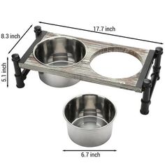 two stainless steel bowls with black handles are shown on a white background and measurements for each bowl