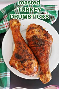 roasted turkey drumsticks on a white plate