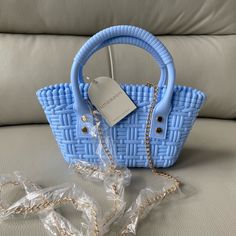 Nwt - Cutest Little Light Blue Rubber Hand Bag With Removable Gold Chain Strap. Great For The Pool Or Beach To Carry Phone Or Essentials And Not Worry About Them Getting Wet! Approx Measurements 8 X 5 X 2” Buy Now - I Ship Out Same Business Day Casual Blue Handheld Shoulder Bag, Casual Blue Handheld Bucket Bag, Casual Blue Handheld Satchel, Trendy Light Blue Shoulder Bag With Double Handle, Trendy Light Blue Tote Shoulder Bag, Trendy Light Blue Shoulder Bag For Shopping, Trendy Light Blue Double Handle Shoulder Bag, Blue Trendy Bucket Bag With Handles, Trendy Blue Bucket Bag With Large Capacity