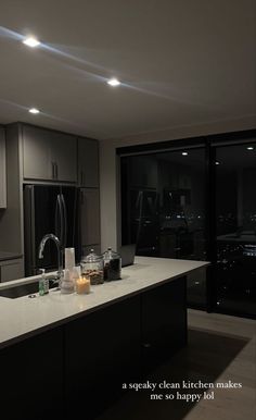 a kitchen with an island counter top next to a refrigerator freezer oven and dishwasher