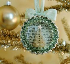 a christmas ornament hanging from the top of a tree