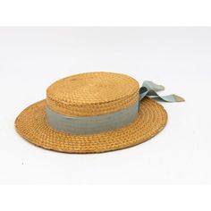 The Ridgemont Make's vintage 1930s boater hat showcases timeless elegance with its natural straw construction. Adorned with a pale blue ribbon and bow, this hat epitomizes classic style. The sturdy yet lightweight straw provides comfort and durability, while the charming ribbon adds a touch of sophistication. This boater hat captures the essence of vintage summer fashion, making it a coveted accessory for collectors and design enthusiasts alike. Seven are available for a display collection. Some Blue Ribbon Bow, Vintage Summer Fashion, Vintage Straw Hat, Christmas Parade, Boater Hat, Ribbon Bow, Vintage Summer, Blue Ribbon, Straw Hat