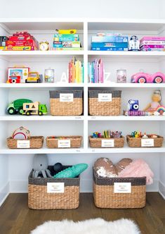 the shelves are filled with toys and other items for playrooms, such as bookshelves