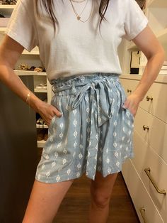 Stay stylish and comfy this summer with Grayton Beach Paperbag Waist Shorts. Made from lightweight fabric, these shorts are perfect for warm weather. Pair them with a basic top or tank for an effortless and on-trend look in blue and white. As cute as they are comfortable, these shorts are a must-have for any wardrobe! Shorts measures 15" in length. Inseam measures 3.75". Measurements taken on a small. Shorts have a stretchy elastic waistband with lots of stretch but actual fabric has no stretch. Small Shorts, Deodorant Stains, Scarf Hat, Basic Tops, Shoe Box, Hat Hairstyles, Lightweight Fabric, Sales Gifts, Warm Weather