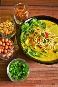 the food is prepared and ready to be eaten on the table with other dishes around it