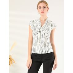 An easy choice for work or daily wear. Feminine polka-dot prints dance on this flutter-sleeve blouse which is finished with a tie neck. Flare sleeves bring a feminine flutter to this blouse with a charming pussycat bow at the front for an office lady look. This tie-neck blouse is the Monday meeting top that you never knew you needed. Office Blouse, Linen Shorts Women, Women Chiffon Blouse, Polka Dot Tie, Cap Sleeves Blouse, Flare Sleeves, Cap Sleeve Top, Women's Blouses, Tie Neck Blouse