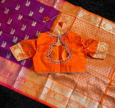 38  size Stitched blouse Venkatagiri Pattu Silk Saree | RaniZaver Saree Comes with pre-stitched stitched blouse ! Fall, Pico and Tassles are done! Sleeve length : 11 inches Blouse length : 14.5 inches Bust : 38 inches with margin will go upto 42 Opening : Front Padded : YES Please message seller with any queries. WhatsApp : 512.694.1893 NOTE: Slight variation in color possible due to how the camera captures the color. Colors and texture show differently in daylight vs indoor lights. Make sure you FAVOURITE my shop to get notified when new items are added!! Paithani Silk Blouse With Traditional Drape, Traditional Paithani Silk Blouse For Designer Wear, Traditional Designer Paithani Silk Blouse, Festive Paithani Silk Blouse With Cutdana, Paithani Silk Blouse With Cutdana For Navratri, Festive Anarkali Blouse In Paithani Silk, Traditional Orange Blouse With Self Design, Paithani Silk Blouse For Puja And Diwali, Festive Paithani Silk Blouse