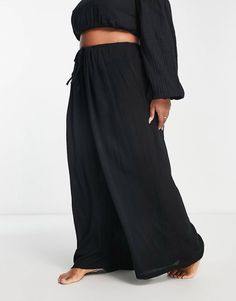 ASOS DESIGN Curve drawstring palazzo beach pants in black | ASOS Chic Beach Wide Leg Pants With Drawstring, Chic Wide Leg Beach Pants With Drawstring, Solid Wide Leg Beach Pants With Drawstring, Black Beachwear Pants For Beach Season, Black Wide Leg Pants For Beach Season, Black Pants For Beach Season, Black Wide Leg Pants For Beach In Spring, Black Wide Leg Beach Pants For Spring, Black Wide Leg Pants For Beach Spring Season