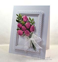 a card with some pink flowers on it