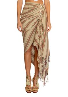 TULUM SKIRT RED/BROWN #stylemyjaunt #vacationstyle #travel #luxury #luxuryresort #fall #trending #fashion #ootd #ootw #blogger #travelblogger #luxuryfashion #vacationblogger #travelmoments #travelgoals #instafashion #bucketlist #travelaccessories #wanderlust #explorepage #explore #viral #beachaccessories #vacationoutfit #fitcheck Bohemian Wrap Skirt For Beach In Summer, Bohemian Wrap Skirt For Summer Beach, Summer Beach Long Sarong, Bohemian Beige Asymmetrical Skirt, Bohemian Style Beige Asymmetrical Skirt, Summer Asymmetrical Skirt For Beach, Summer Long Wrap Skirt For Beach, Summer Long Wrap Skirt For The Beach, Bohemian Brown Bottoms For Beach Season