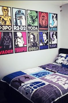 a bedroom with star wars posters on the wall above the bed and in between the bedspread