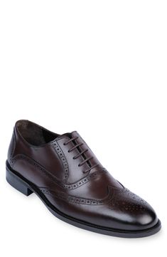 Handmade of smooth leather, this wingtip toe dress shoe with a classic oxford silhouette offers a sophisticated, elegant look. Leather upper and lining/synthetic sole Made in Turkey Wingtip Oxford, Elegant Look, Dress Shoe, Mens Oxfords, Smooth Leather, Nordstrom Rack, Derby, Dark Brown, Dress Shoes Men