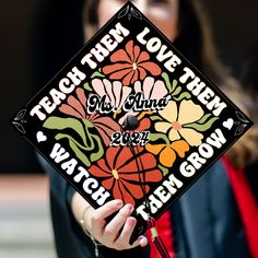 a woman wearing a graduation cap that reads teach their love then watch them grow