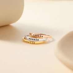 These stacking name rings are great ways to wear children's names. A great gift for any occasion  ► DAINTY STACKING NAME RING * Character limits: 10 characters. * By default, silver items comes with BLACK engraving and gold-plated item comes with CLEAR engraving * All of our jewelry are handmade from scratch and packaged with care in our workshop ► HOW TO ORDER & ADD PERSONALIZATION - Select your preferred color and size ring from the menu. - Include in the "Add your personalization" box the pet Mother's Day Adjustable Stackable Rings With Custom Name, Adjustable Stackable Rings With Custom Name For Mother's Day, Adjustable Stackable Rings For Birthday, Personalized Gold Stackable Rings For Birthday, Nameplate Rings Suitable For Gifts, Nameplate Ring As Gift, Customizable Stackable Rings For Mother's Day, Customizable Stackable Rings For Mother’s Day, Custom Name Adjustable Stackable Rings For Personalized Gift