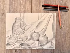 a pencil drawing of two apples and a mason jar on a table next to some crayons