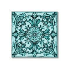 a blue tile with an intricate design on it