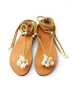 Hey, I found this really awesome Etsy listing at https://www.etsy.com/listing/727640471/sea-shells-pearls-rope-sandals-wedding Gold Sandals For Summer Beach Wedding, Elegant Handmade Beach Sandals, Handmade Ankle Strap Sandals For Beach Wedding, Cream Single Toe Strap Sandals For Beach, Beach Season Wedding Ankle Strap Sandals, Ankle Strap Sandals For Beach Season Weddings, Beach Wedding Open Toe Sandals, Adjustable Sandals For Summer Destination Wedding, Adjustable Sandals For Destination Wedding In Summer