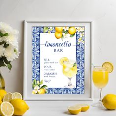 a lemonade bar sign next to two glasses of lemonade and some sliced lemons