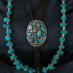 Turquoise Cluster Bolo by Leigha Cleveland Southwestern Turquoise Necklace For Western-themed Events, Traditional Turquoise Concho Jewelry, Traditional Hand Tooled Turquoise Jewelry, Traditional Turquoise Jewelry With Concho, Traditional Hand-tooled Turquoise Jewelry, Southwestern Blue Jewelry For Western-themed Events, Handmade Turquoise Jewelry For Western-themed Events, Southwestern Turquoise Necklace For Festivals, Southwestern Silver Turquoise Necklace For Western Events