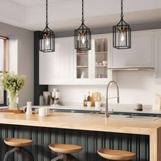 a kitchen with three stools next to a counter and some lights hanging from the ceiling