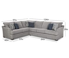 a sectional couch with pillows and measurements for the top half, bottom half and bottom half