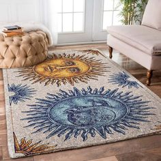 an area rug with sun and moon designs on it