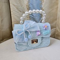 Features: -Light Blue Lace -Pearl Handle -Twist Clasp Measurements: -6 1/2" L -5" W Brand New No Trades Cute Blue Bag For Spring, Cute Blue Spring Bag, Elegant Blue Summer Bags, Hello Kitty Makeup Bag, Henri Bendel Handbags, Eye Glasses Case, Black Bucket Bag, Couture Makeup, Hello Kitty Makeup