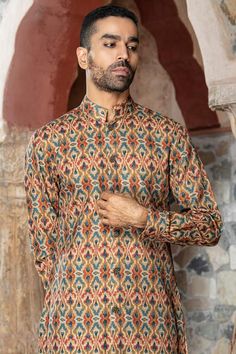 Brown kurta with all over mandala print. Paired with a pant. - Aza Fashions Linen Kurtas, Brown Mandala, Men Kurta, Mandala Print, Kurta With Pants, Full Sleeves, Metal Buttons, Aza Fashion, Auburn