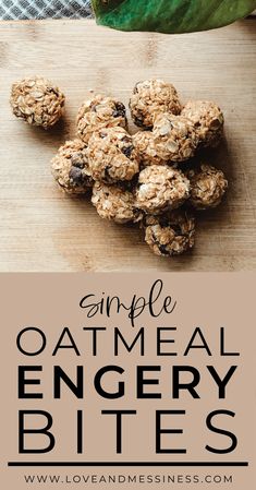 some oatmeal energy bites are on a cutting board with a green leaf