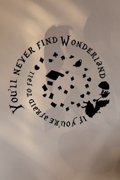 there is a logo on the wall that says you never find wonderlandland