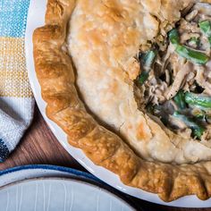 a chicken pot pie with mushrooms and green peppers