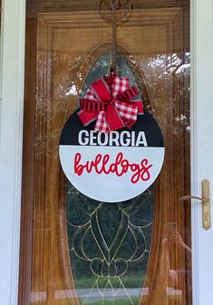 a door with a sign that says georgia bulldogs on it