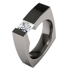 a black and white ring with a diamond in the center, on a white background