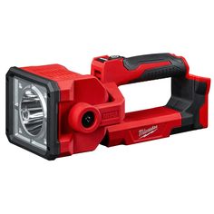 a red and black work light on a white background