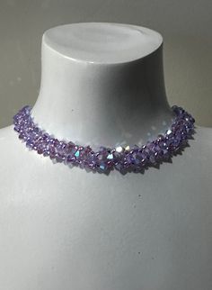 Genuine crystal, genuine crystal choker, chic, luxury jewelry, women, fashion, purple ab2x A color easy to tune, bright, to wear in any situation! Length to the clasp: 30 cm + 5 cm of chain Width: 0.8 cm Material: crystal, rocailles, stainless steel primers guaranteed without nickel We call crystal, the glass whose refractive index is equal or higher than 1.545. Unlike glass, crystal has more clarity, more brightness. Purple Necklace Crystal, Purple Crystal Necklaces For Party, Purple Crystal Bracelet For Party, Crystal Neckless, Purple Jewelry Necklace, Violet Accessories, Purple Choker Necklace, Purple Crystal Necklace, Victorian Gothic Jewelry