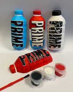 three different types of paint and some bottles