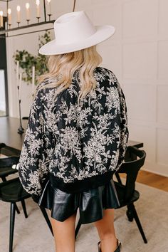 - Layer up in chic style with this adorable bomber jacket! Whether you're strolling through the city or keeping cozy in your own backyard, this sweet piece is sure to warm your heart and steal the show. - Fully lined warm material with cream colored abstract floral print - A bomber style collared neckline - A zip closure front - Long sleeves with ribbed cuffs - Functional side pockets - A slouched silhouette that ends in a ribbed waistband - Model is wearing a size medium for a more oversized fi Chic Black Floral Print Outerwear, Fall Outerwear With Blouson Long Sleeves, Cream Floral Print Outerwear For Fall, Fall Outerwear With Blouson Sleeves And Long Sleeve, Winter Outerwear With Blouson Long Sleeves, Spring Cream Outerwear With Ribbed Cuffs, Cream Outerwear With Ribbed Cuffs For Spring, Abstract Floral Print, Abstract Floral