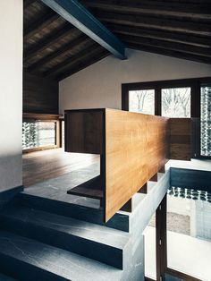 an empty room with stairs leading up to it