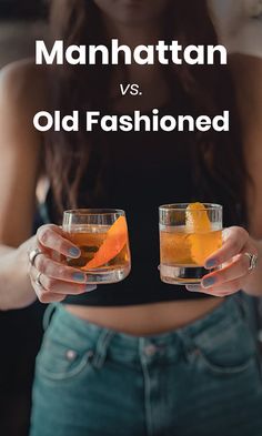 two women holding glasses with drinks in them and the words manhattan vs old fashioned on top