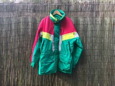 "Vintage Swedish men snow jacket with lots of pockets and adjustable waist. Bright colours, green, pink and yellow. Size - vintage men size 52 Measured flat- Shoulder seam to shoulder seam 58cm ( 23\") Underarm to underarm 65cm (25.5\") Sleeve length, from shoulder to edge 62cm ( 24.5\") Length 82cm (32\") It is in excellent vintage condition, looks like unused. Real colors may be little different from their appearance on your display. Pleas look at the pictures carefully. I will be happy to ans Swedish Men, Ski Jacket Mens, Cotton Bras, Swedish Design, Snow Jacket, Pink And Yellow, Bright Colours, Ski Jacket, Vintage Wool