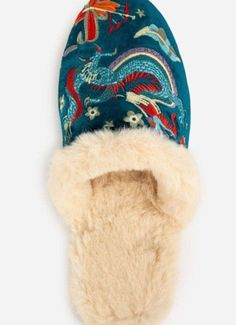 JOHNNY WAS   DRAGON EMBROIDERED SLIPPERS RETAIL $128.00 SIZE US WOMENS 7 NEW IN DUST BAG           Providing unparalleled comfort, the Dragon Embroidered Slipper is the height of luxe home lounging. Lined with sherpa material for cozy warmth, these slippers are a must-have for the cooler season. Polyester Embroidered Design Super Soft Velvet Soft Fur Lining                             PRICES ARE FIRM ON ALL OF MY ITEMS AS I PRICE THEM AS LOW AS I CAN AND STILL REMAIN IN BUSINESS.   See my other listings for more great items! PRICES ARE FIRM ON ALL OF MY ITEMS AS I PRICE THEM AS LOW AS I CAN AND STILL REMAIN IN BUSINESS.   All major credit cards and forms of payment accepted.     USPS GROUND ADVANTAGE or US PRIORITY MAIL PLEASE USE SHIPPING CALCULATOR    WORLDWIDE SHIPPING ALSO AVAILABLE Embroidered Slippers, Velvet Mules, Luxe Home, Teal Velvet, Chic Shoes, Deep Teal, Johnny Was, Sherpa Blanket, Pair Of Pants