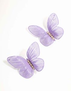 two purple butterfly shaped earrings with crystal stones on each side and one in the middle