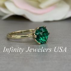 "The ring pictured is lab created emerald #5837 Also Shown in 14k White Gold -Approximate total carat weight: approx. 1.90ctw diamond equivalent -Center Stone Size: 8mm - approx. 1.90ct diamond equivalent -Center Stone Shape: round / rose cut -Gem Type: lab created emerald -Stone Clarity: VS2 -Stone Color: Green -Moh's Scale: 8x.5 hardness -Metal Type and Purity: 14k yellow gold -Setting: 6 prong crown head -Stock Ring Size: 6 -Country of Manufacturing: USA (Michigan) For customization please co Elegant 14k Stamped Emerald Ring, Classic Yellow Gold Emerald Wedding Jewelry, 14k Gold Brilliant Cut Emerald Ring, 14k Gold Emerald Ring For Proposal, Proposal Jewelry With May Birthstone In Round Cut, Round Cut May Birthstone Jewelry For Proposals, Classic May Birthstone Jewelry For Proposal, May Birthstone Jewelry For Proposal With Round Cut, 14k Gold Emerald Ring With Brilliant Cut For Promise